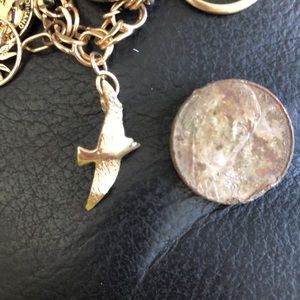 Gold flying bird seagull charm pendant 80’s art fair unmarked about 1” beach